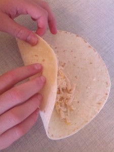 put mixture into taco shell and roll
