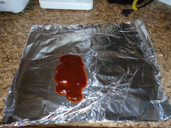 put barbecue sauce on aluminum foil