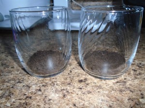 clear cups with cookie crumbs in bottom