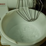 Add Whip Topping to ice water in bowl.